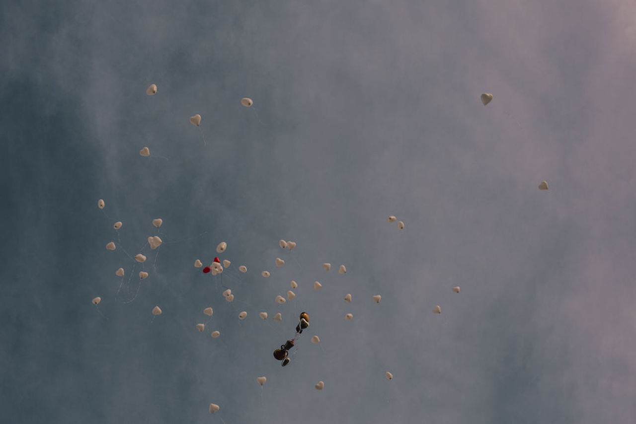 Engagement balloons released in the sky Engagement balloons released in the sky