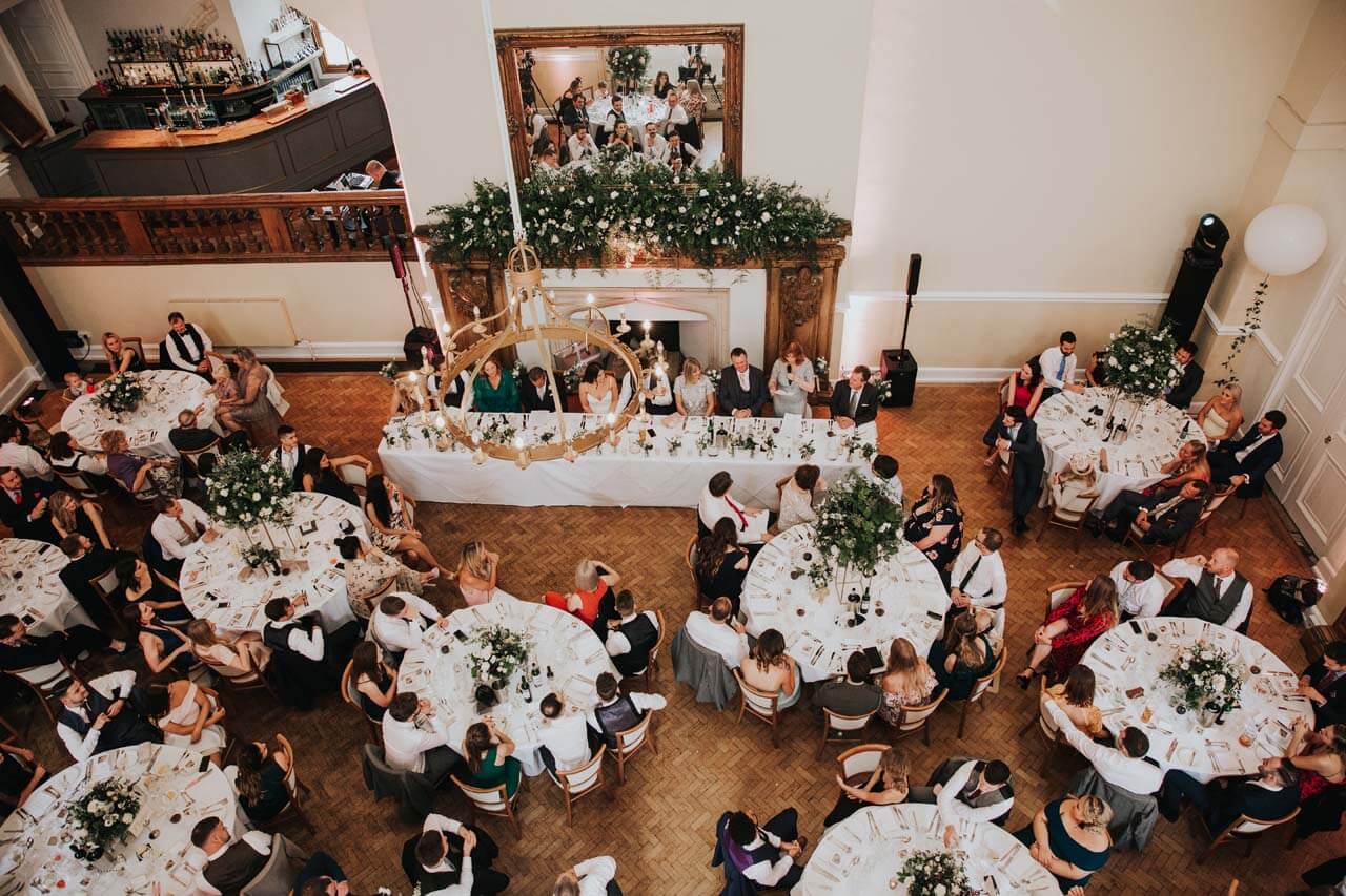 An aerial view of tables laid out for a wedding